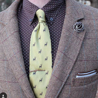 Brown Felt Lapel Flower with white trimmings.