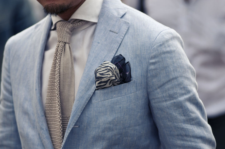 Muted coral and midnight blue silk pocket square