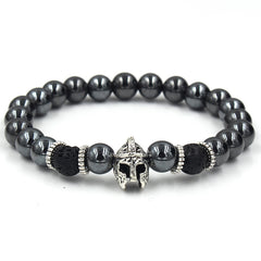 Black beaded bracelet with silver helmet