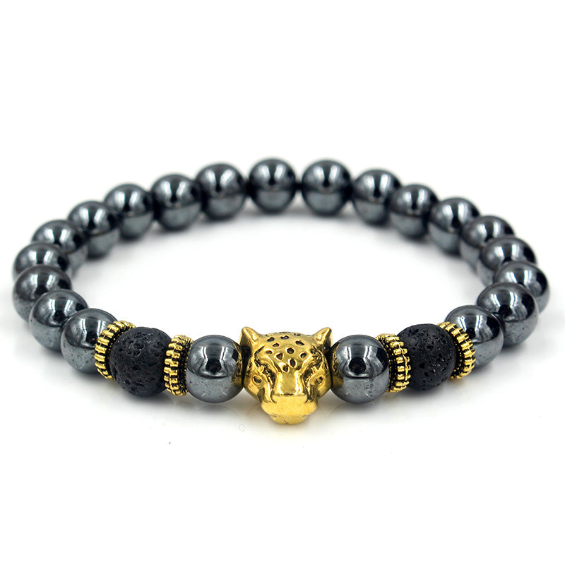 Black beaded bracelet with gold leopard's head