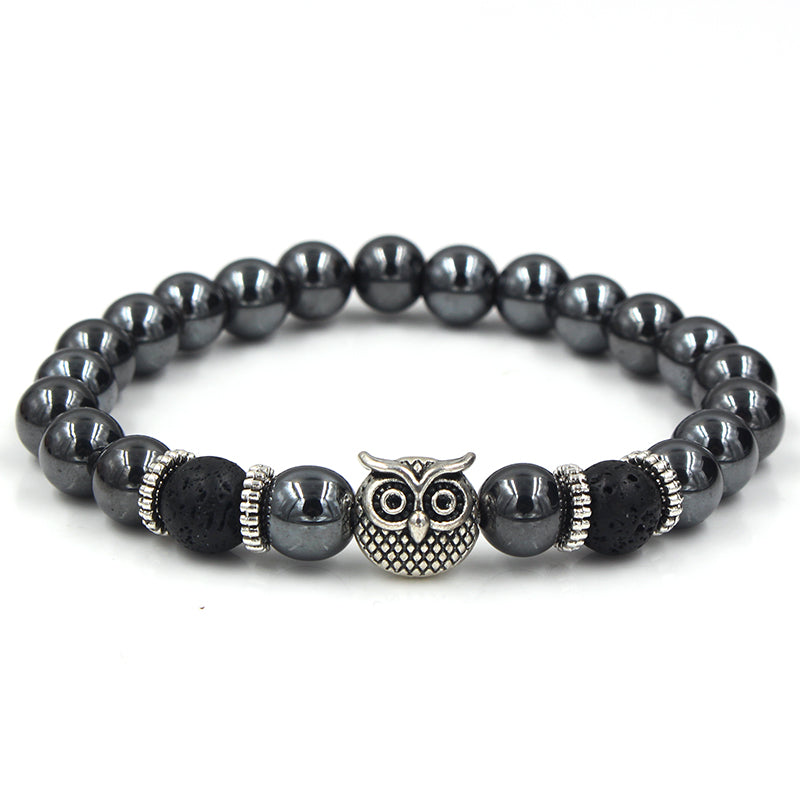 Black beaded bracelet with silver owl's head