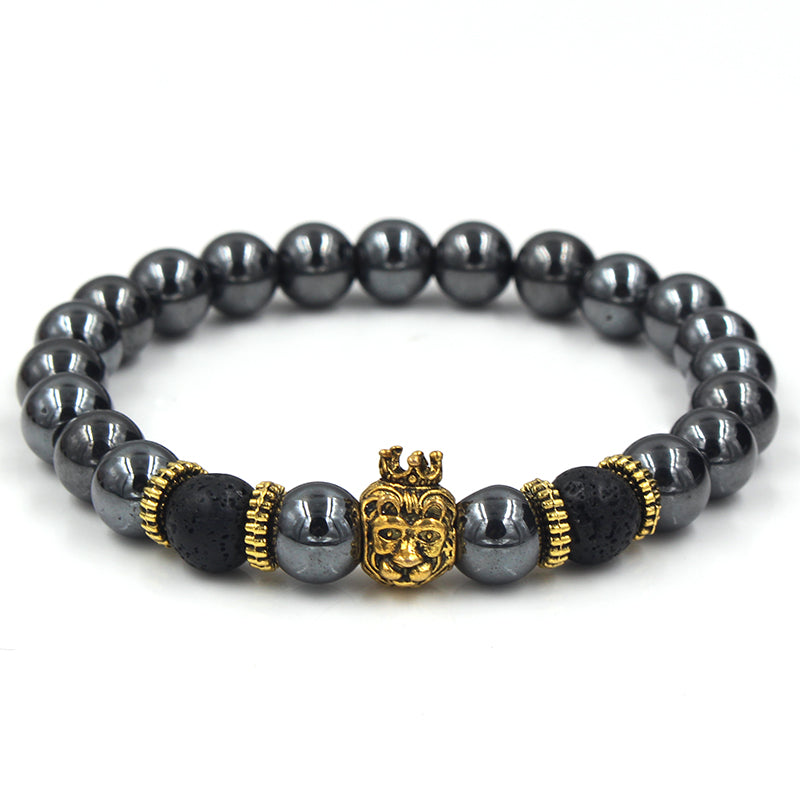 Black beaded bracelet with gold lion's head
